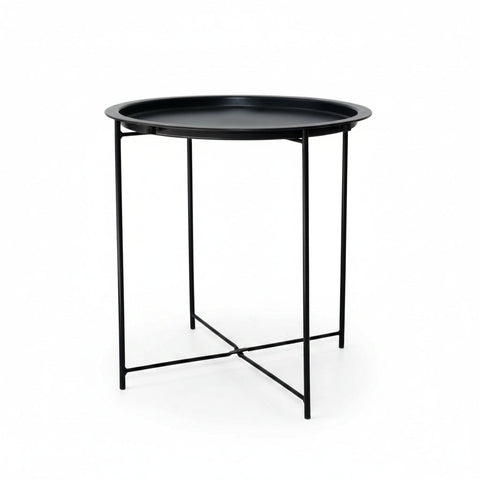 Black side table with round tray top on a white background